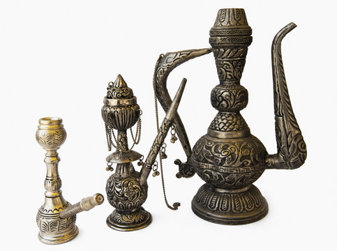 Close-up of antique hookahs