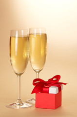 Two wine glasses and small gift box