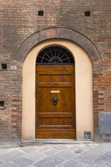 Fototapeta na wymiar Closed door of a building, Siena, Siena Province, Tuscany, Italy