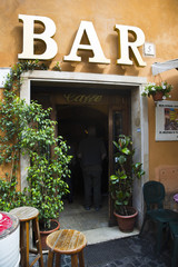 Fototapeta na wymiar Entrance of a bar, Trastevere, Rome, Rome Province, Italy