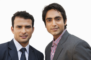 Portrait of two businessmen smiling