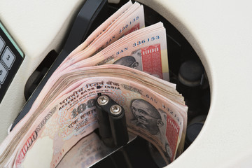Obraz premium Close-up of a money counting machine