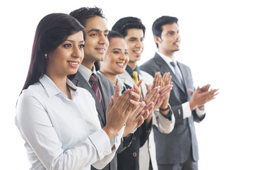 Business executives applauding
