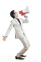 Fototapeta premium Businessman shouting into a megaphone