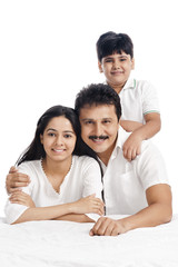 Portrait of a smiling boy with his parents