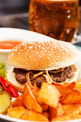 burger with mug of beer