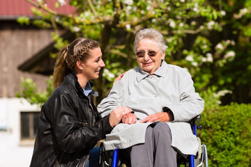 Fototapeta na wymiar woman visiting grandmother in nursing home