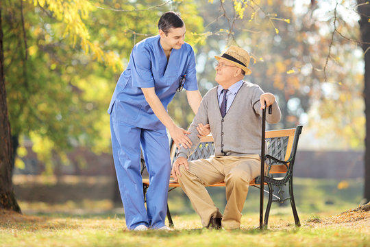 Healthcare professional during a conversation with senior man