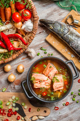 Closeup of fresh fish and vegetables for a healthy soup