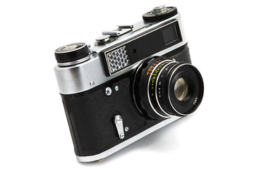Old film camera isolated on white background