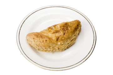 Close-up of a stuffed pastry in a plate