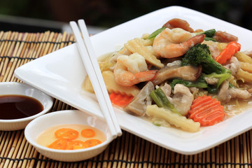 Chinese style stir fried yellow noodles with in gravy sauce