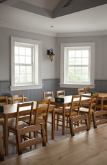 empty restaurant, brown wooden table and chairs in restaurant