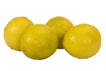 Close-up of four lemons