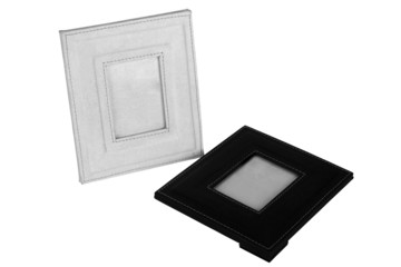 Close-up of two empty photo frames