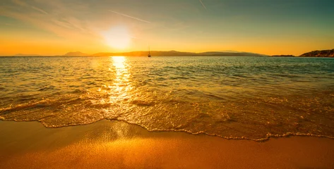 Fototapeten sonnenuntergang sonniger strand © adimas