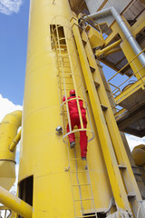 Engineer climbing access shaft