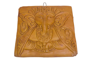 Lord Ganesha engraved on a wooden block