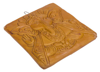 Lord Ganesha engraved on a wooden block