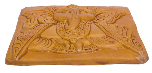Lord Ganesha engraved on a wooden block
