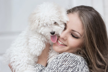 Portrait of a young girl with a dog