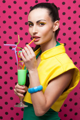 Fashionable Woman with colorful cocktail