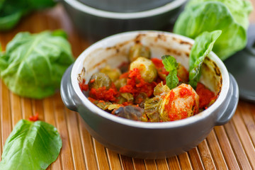 Brussels sprouts baked in tomato sauce