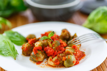 Brussels sprouts baked in tomato sauce