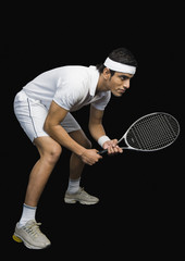 Tennis player practicing with a tennis racket