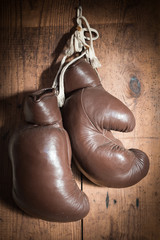 old Boxing Gloves, hanging on wooden wall