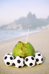 Fresh Coconut with Football Soccer Balls on Beach in Rio