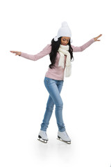 Nice African teenage girl trying to do figure skating.=