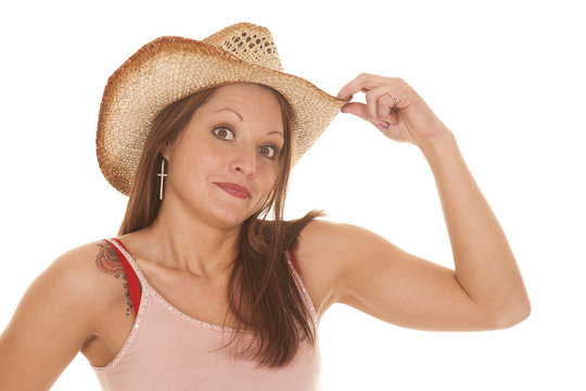 Woman cowgirl hat hold funny expression