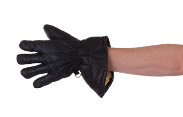 Mans hand in very old black leather glove