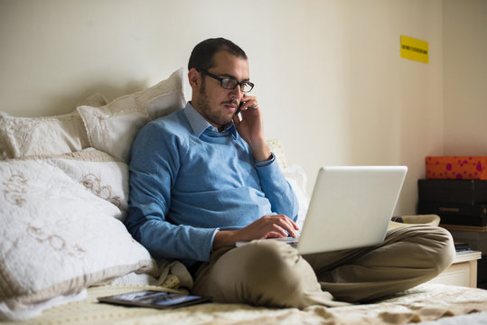 elegant business multitasking multimedia man at home