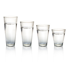 Set of realistic water glasses with different sizes.