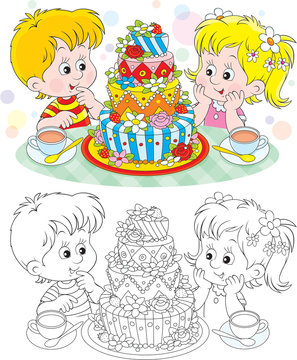 Little girl and boy with a big birthday cake