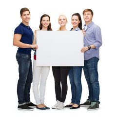 group of smiling students with white blank board