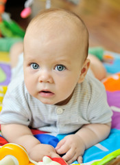 Obraz premium baby on the carpet