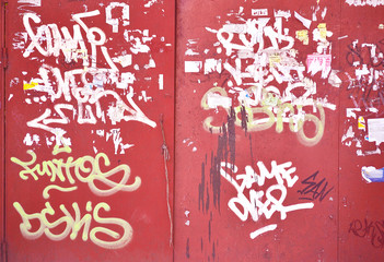 old iron gate with graffiti