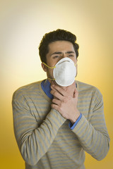 Man wearing a pollution mask