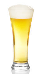 Glass of beer with foam and vials
