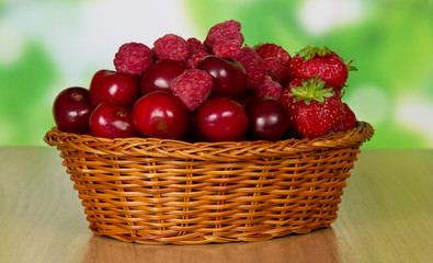 Fototapeta na wymiar Wicker basket with berries