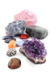 various kinds of crystals on white background