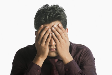 Close-up of a businessman looking upset