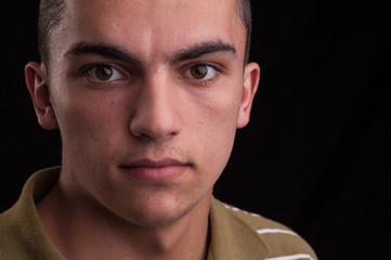 Obraz premium Portrait of young caucasian teenage, closeup headshot
