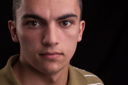 Portrait of young caucasian teenage, closeup headshot
