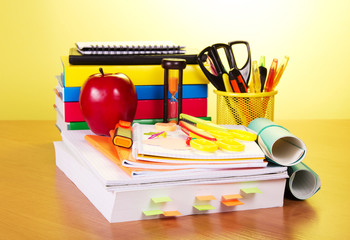 Pile of writing-books and calculator