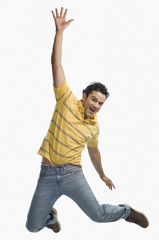 Portrait of a man jumping in excitement