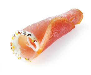 Fresh sliced ham with spice on a white background